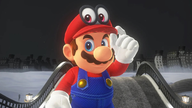 Mario adjusts Cappy on his head in Super Mario Odyssey