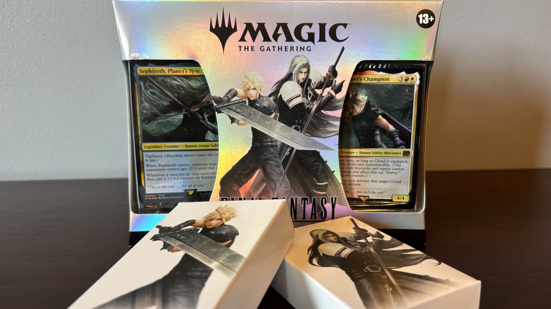 MTG head designer Mark Rosewater says fans must adapt or “walk away” if they don’t like Universes Beyond MTG Final Fantasy Starter Kit on a wooden surface, against a white wall
