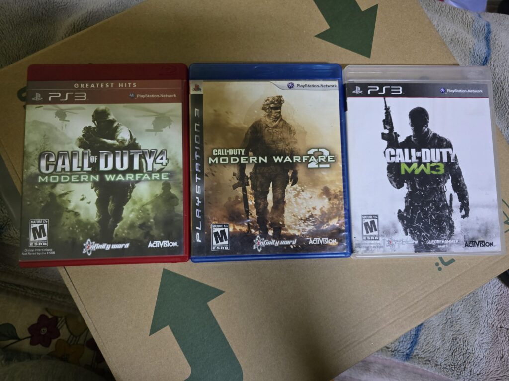 My PHYSICAL discs of [COD4] MW2 AND MW3 games.💿💿
