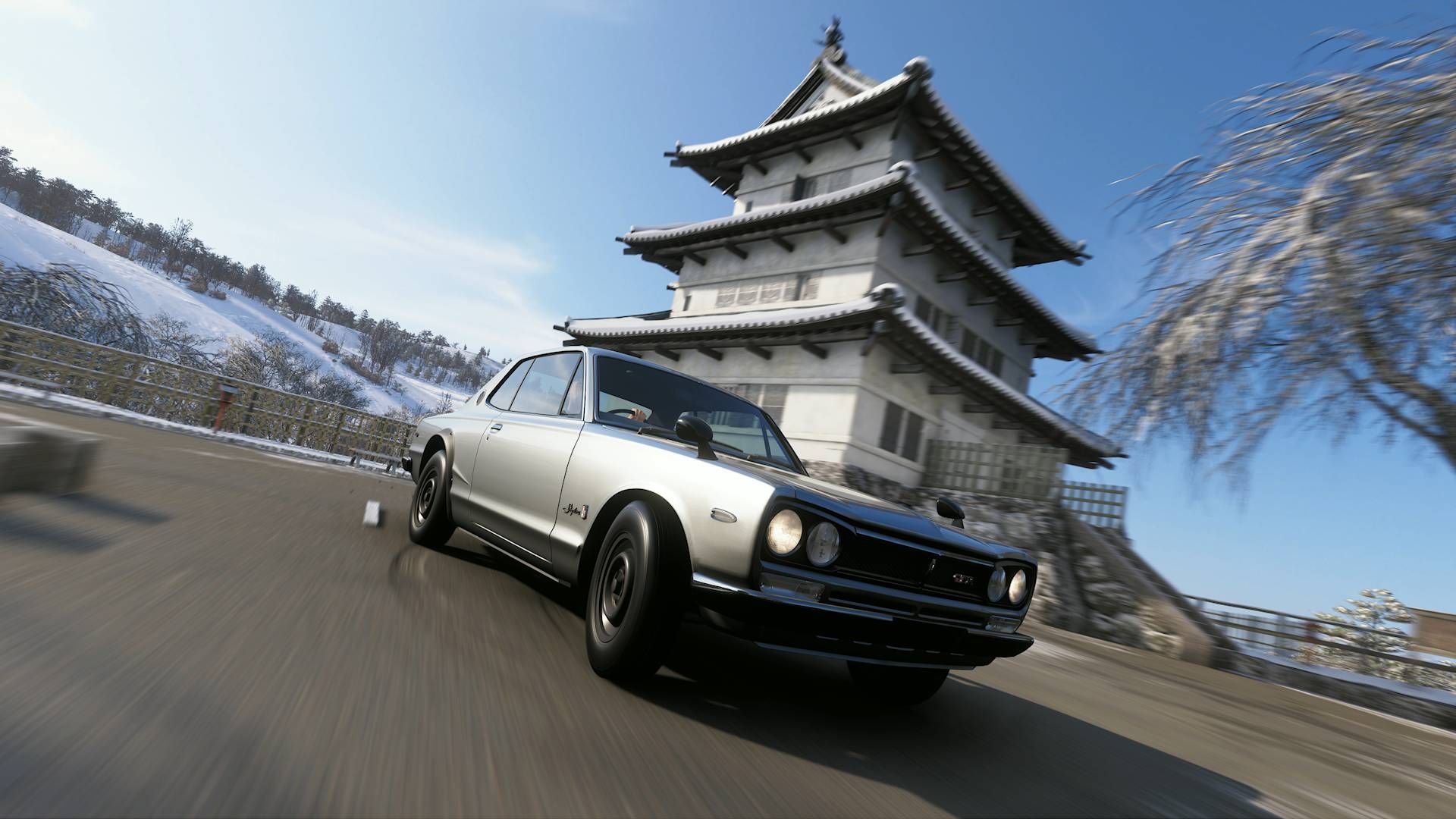 Forza Horizon 6 Hirosaki Castle location Forza Horizon 6 photo of 1971 Nissan Skyline driving in front of Hirosaki Castle in the winter