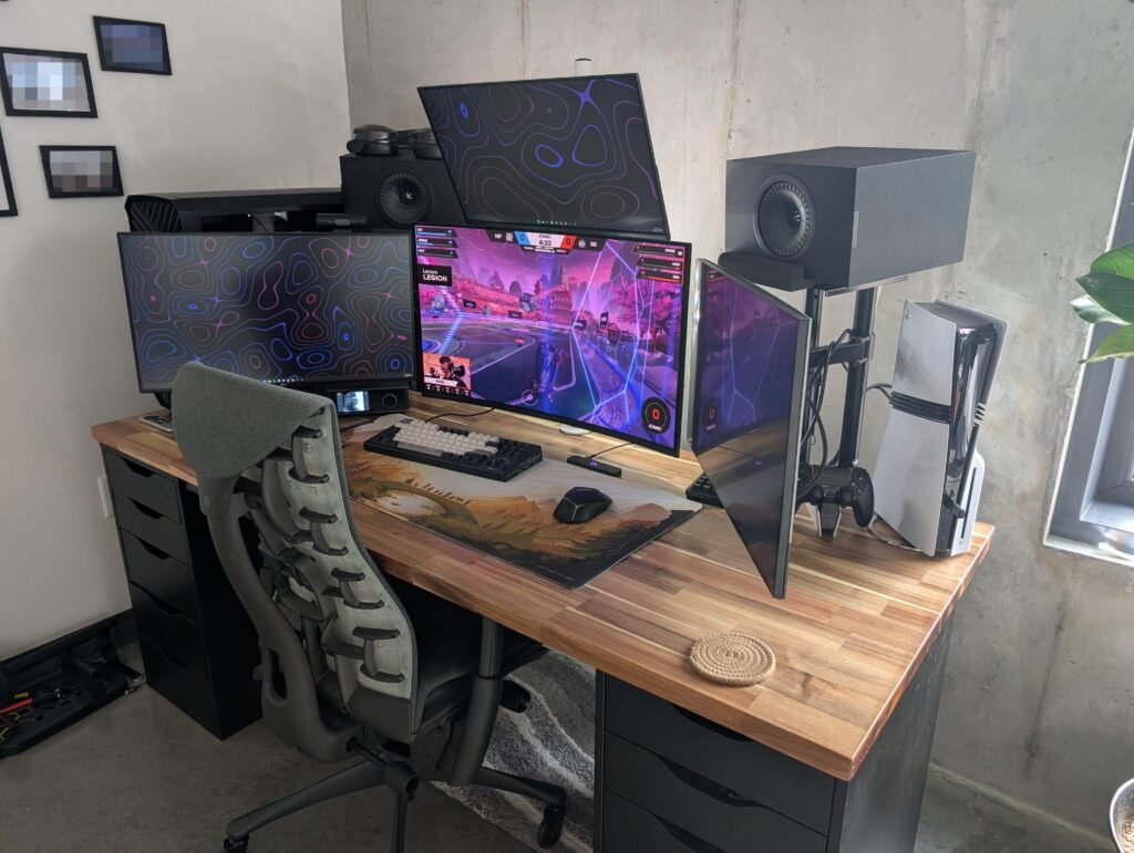 I spend ~12 hours a day here (4x Monitors, RTX 5090 & 9800X3D setup).