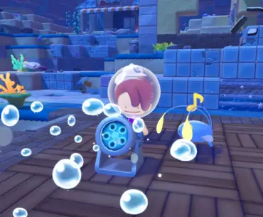 Ditto playing with an underwater bubble machine in Pokemon Pokopia Bubbly Basin