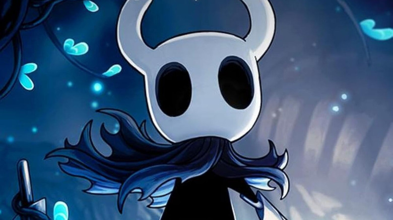 The Knight stands holding a sword on the cover art for Hollow Knight