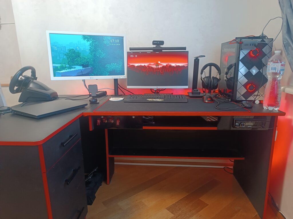My homemade desk, the switches on the under side power the car radio with a subwoofer and two speakers under the desk, the glowing light and turn on the PC.