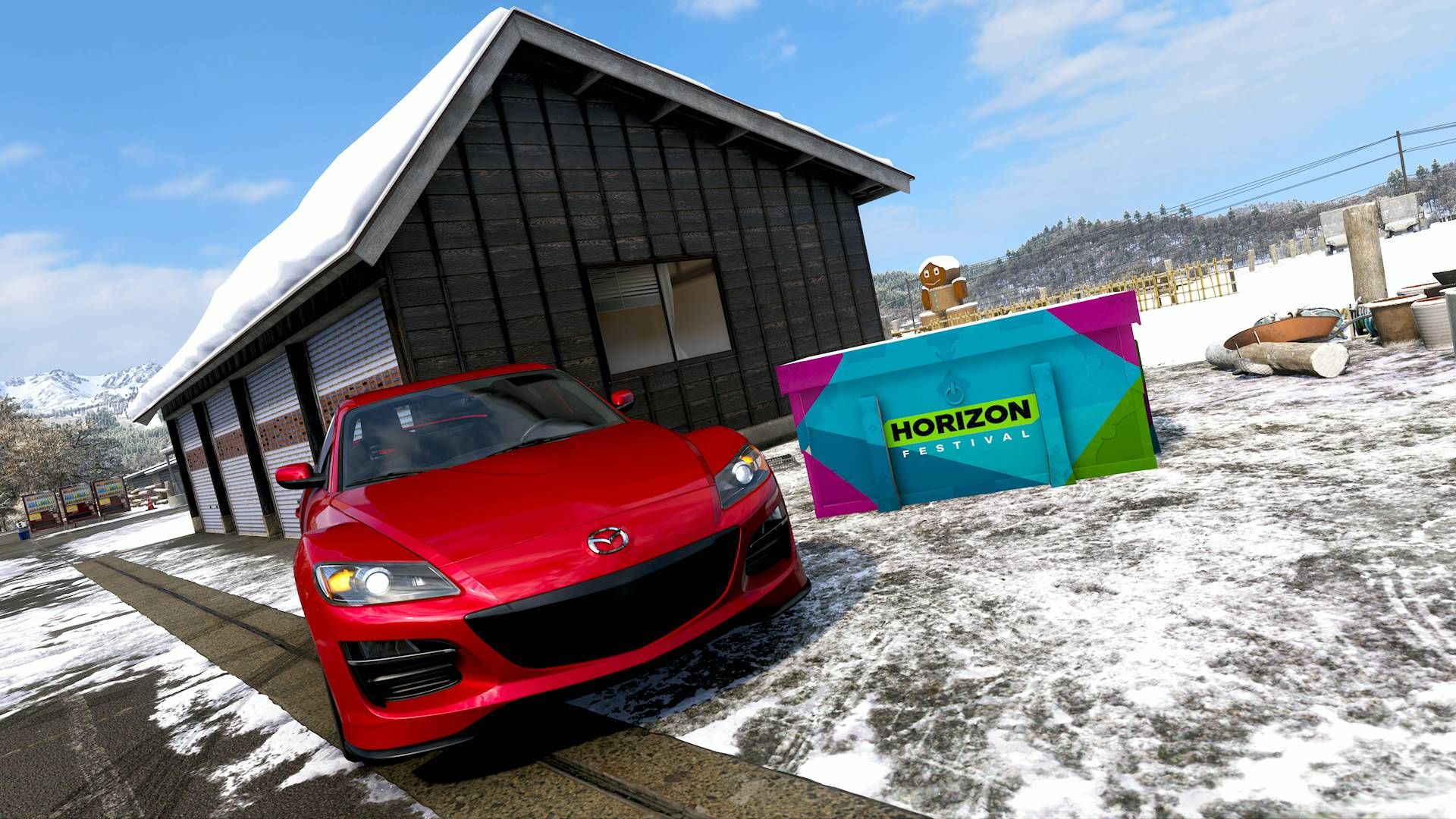 Forza Horizon 6 Hokubu Treasure Hunt location Forza Horizon 6 hokubu winter treasure hunt red car posing next to treasure chest in the snow