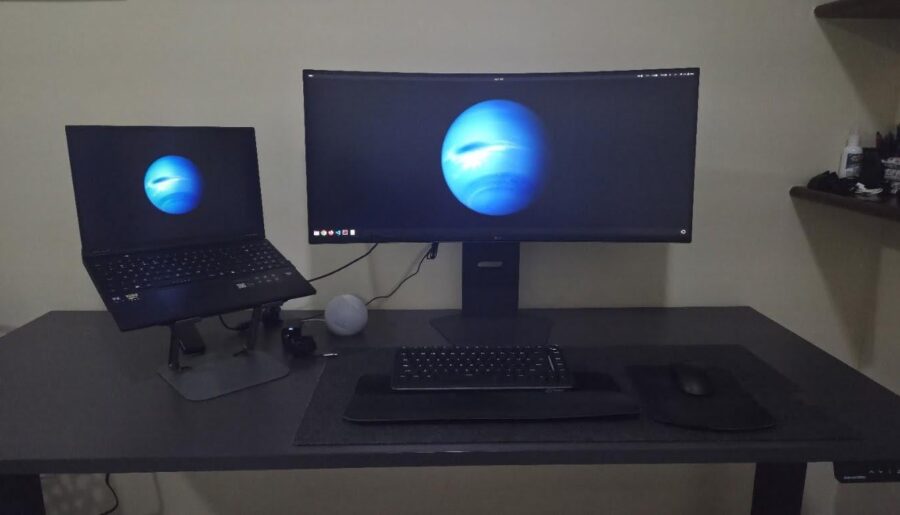 Minimalist dev setup: should I move the laptop to the right side so the mouse dock is reachable?